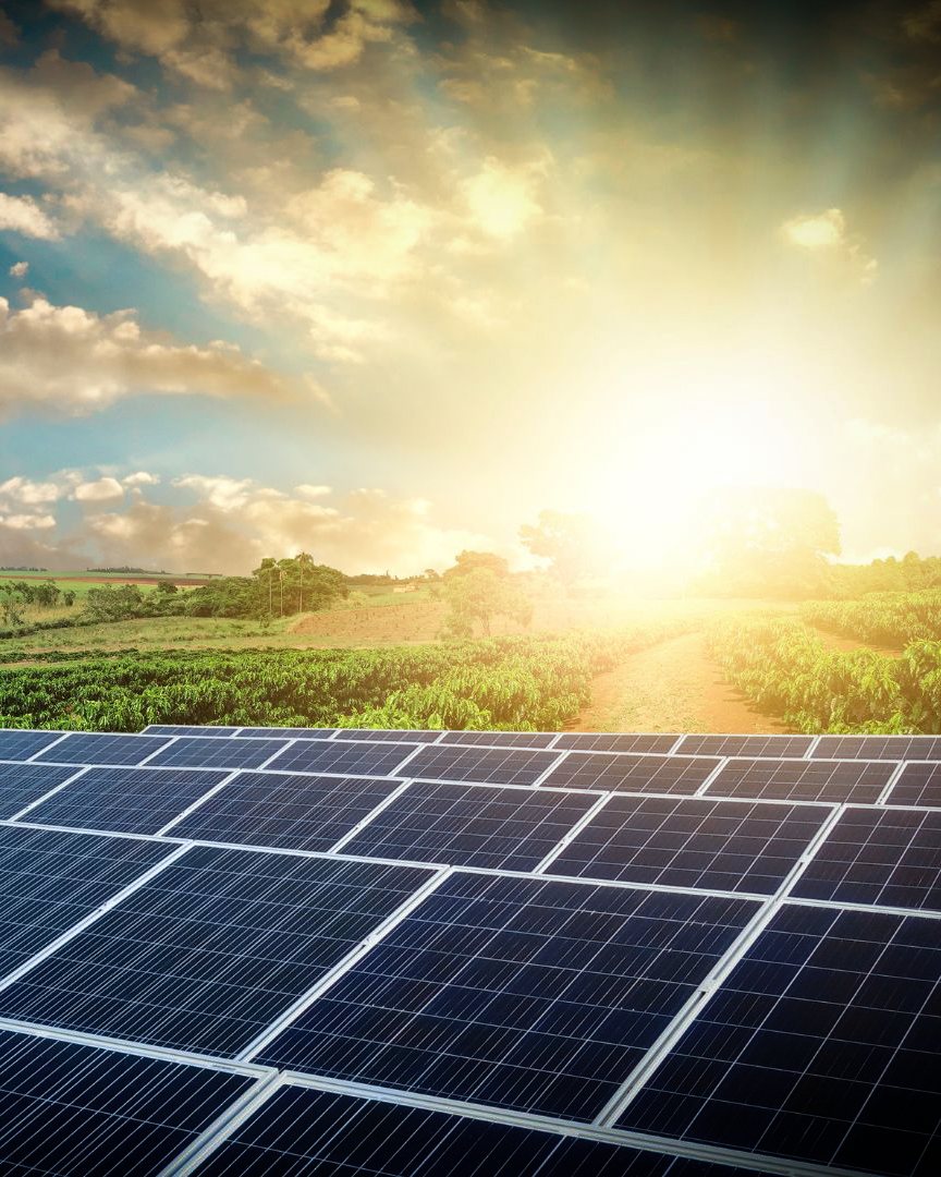 A beautiful sunset over a roof covered with solar panels